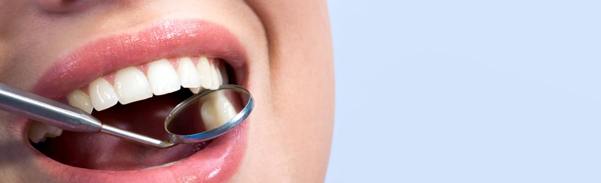 female oral surgery dental check mirror